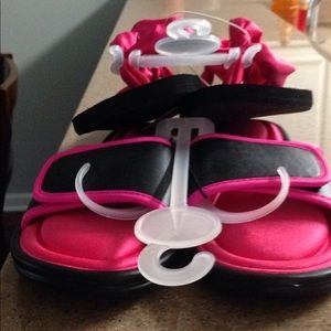 Two pair of sandals as a bundle